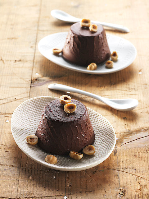 Flanes de mijo al cacao amargo y avellanas